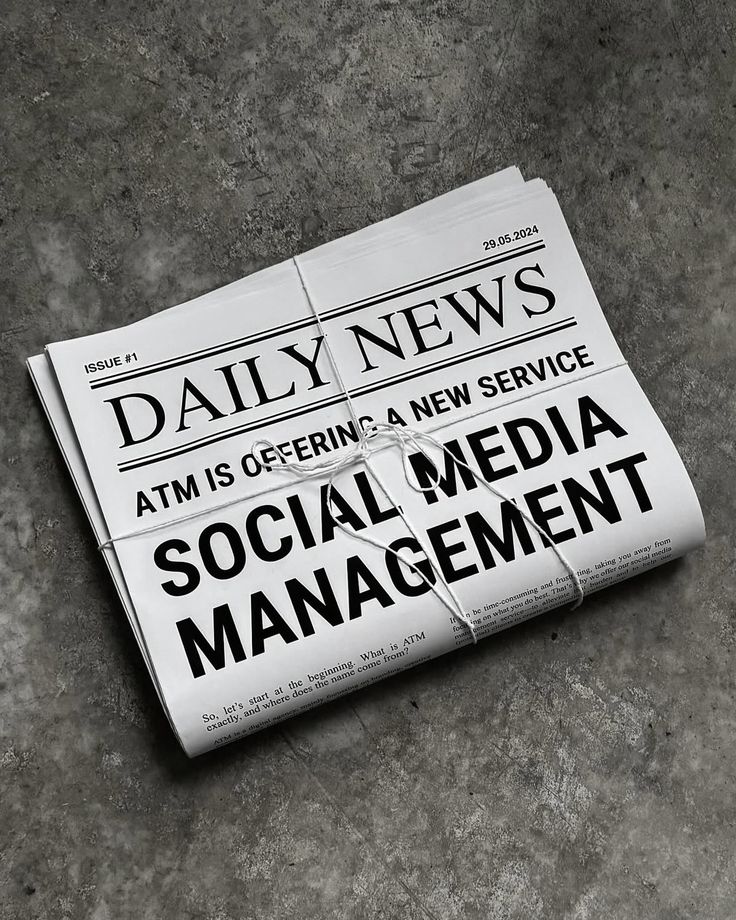 Black and white photo of a newspaper that lies on the ground that says ' social media management' .